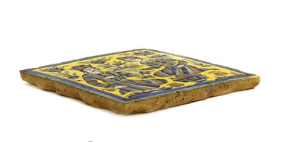 Lot 160 - A Persian Qajar pottery tile