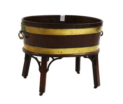 Lot 451 - A George III mahogany and brass bound wine cooler