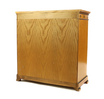 Lot 417 - A Biedermeier style birds eye maple chest of drawers
