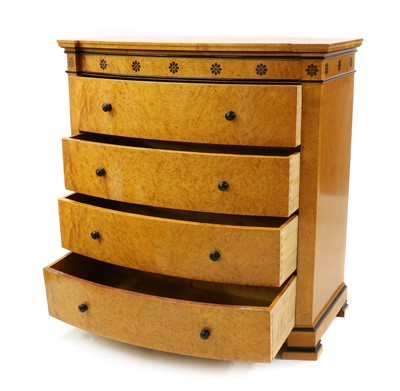 Lot 417 - A Biedermeier style birds eye maple chest of drawers