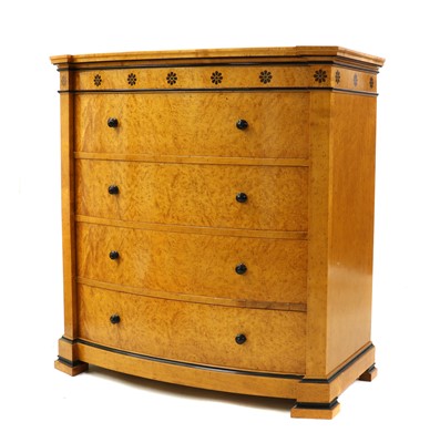 Lot 417 - A Biedermeier style birds eye maple chest of drawers