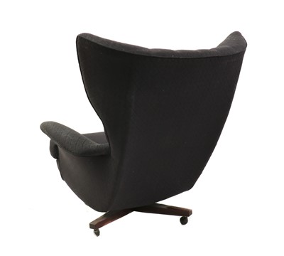 Lot 419 - A G Plan Model 6250 'Blofeld' swivel chair and footstool