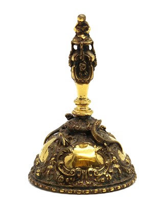 Lot 84 - A silver gilt bell