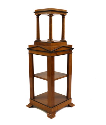 Lot 414 - A Biedermeier style birch and ebonised display stand