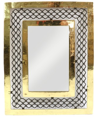 Lot 430 - A David Marshall brass and iron wall mirror