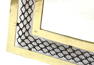Lot 430 - A David Marshall brass and iron wall mirror