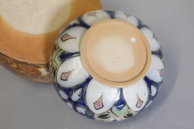 Lot 55 - Four Royal Doulton stoneware bowls