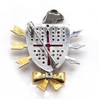 Lot 253 - An 18ct gold, ruby and diamond set shrieval brooch