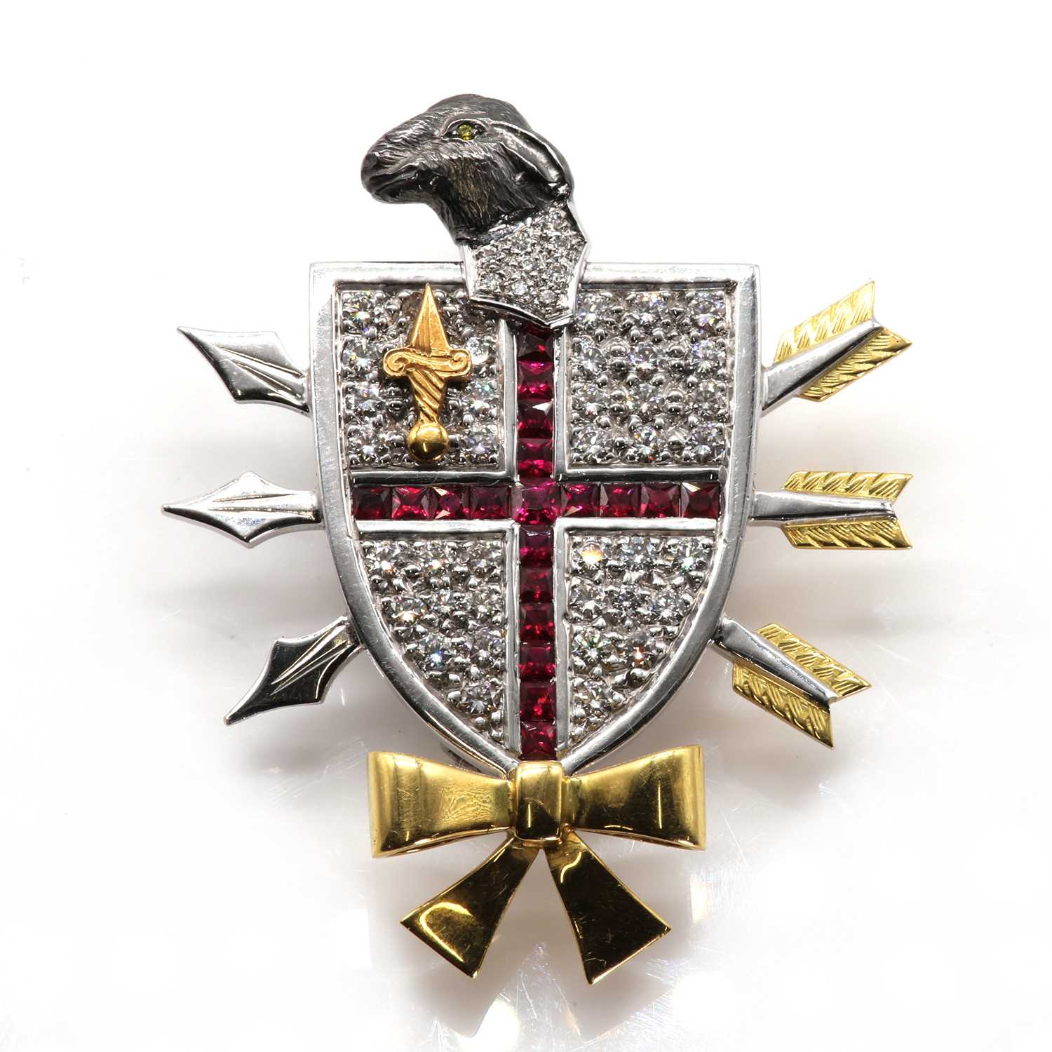 Lot 253 - An 18ct gold, ruby and diamond set shrieval brooch