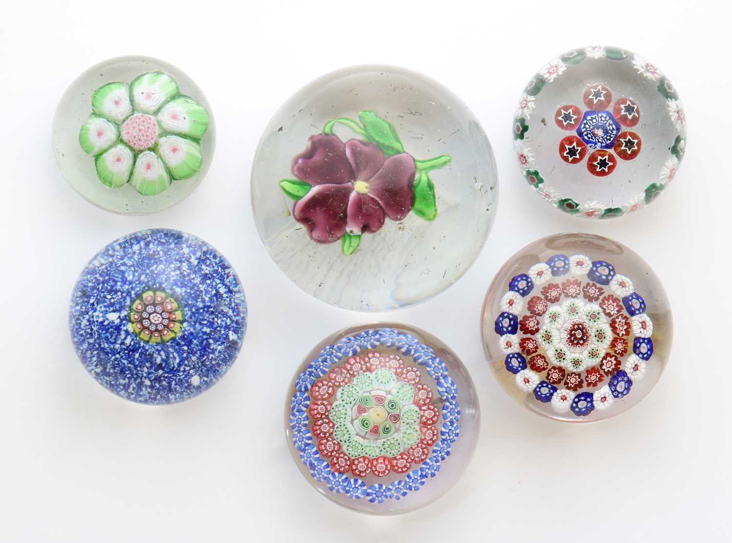 Lot 188 - A collection of glass paperweights