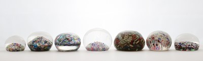 Lot 190 - A group of glass scramble paperweights