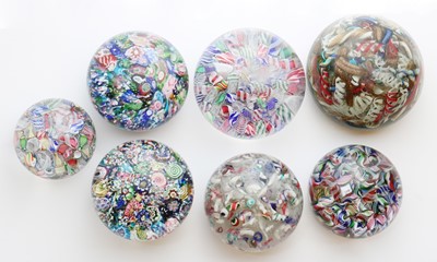 Lot 190 - A group of glass scramble paperweights