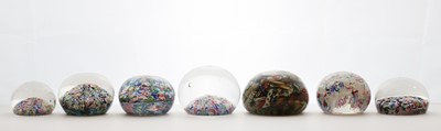 Lot 190 - A group of glass scramble paperweights