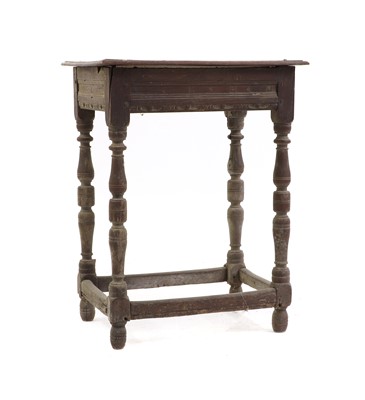 Lot 381 - An oak occasional table