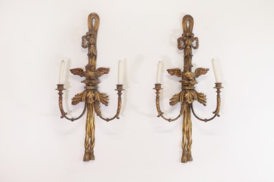 Lot 40 - A pair of George III-style carved giltwood wall sconces