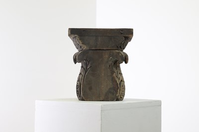 Lot 304 - A carved wooden corbel