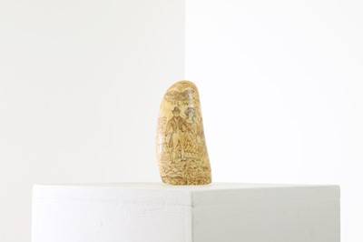 Lot 303 - A scrimshaw sperm whales tooth