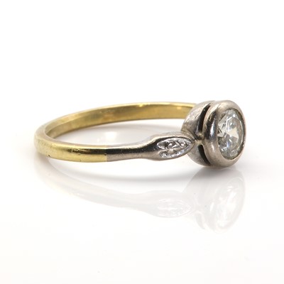 Lot 51 - A two colour gold single stone diamond ring