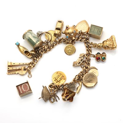 Lot 366 - A gold charm bracelet