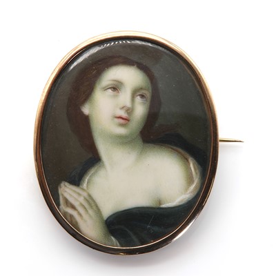 Lot 4 - A painted portrait miniature brooch