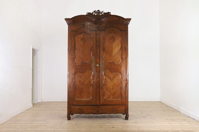 Lot 459 - A Louis XV provincial chestnut armoire