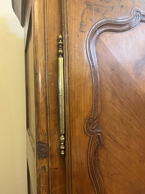 Lot 459 - A Louis XV provincial chestnut armoire