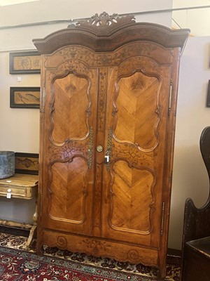 Lot 459 - A Louis XV provincial chestnut armoire