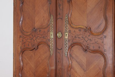 Lot 459 - A Louis XV provincial chestnut armoire