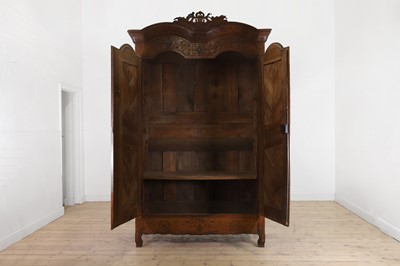 Lot 459 - A Louis XV provincial chestnut armoire