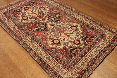 Lot 97 - ☘ A Kirman or Qom rug