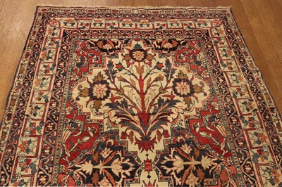 Lot 97 - ☘ A Kirman or Qom rug