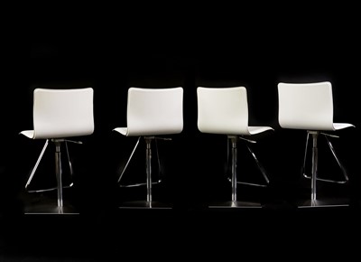 Lot 423 - A set of four Italian white leather bar stools