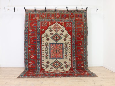 Lot 385 - A Kazak design rug