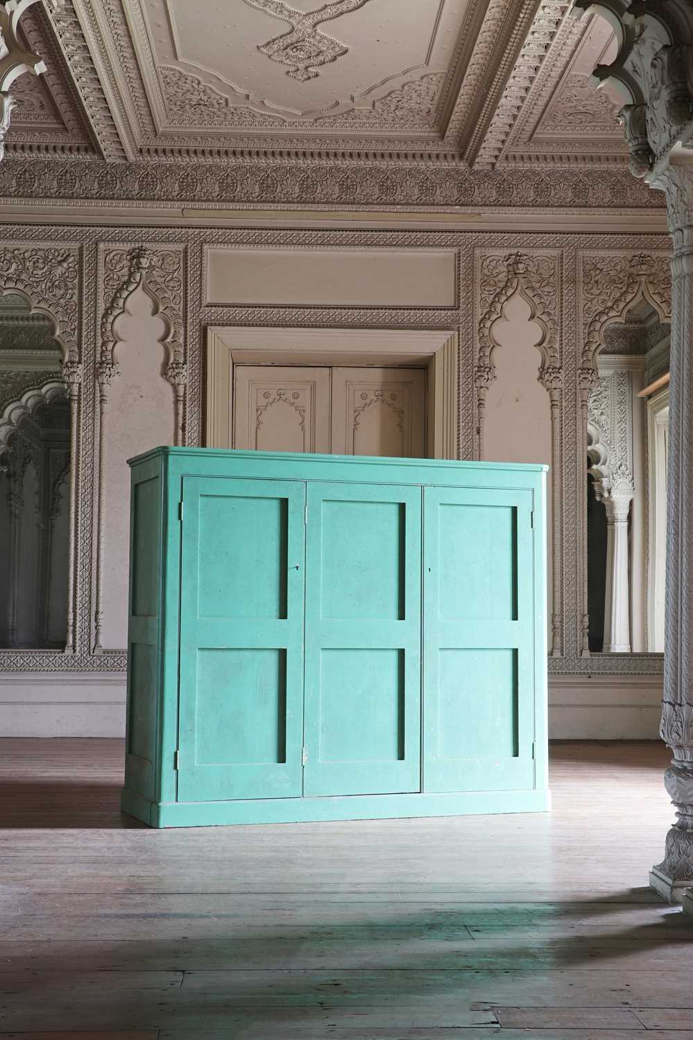 Lot 81 - A large green painted pine housekeeper’s cupboard