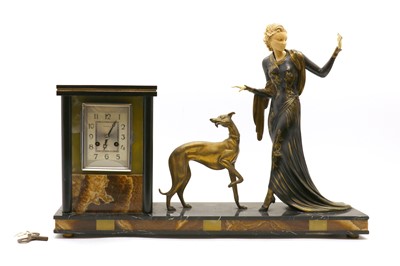 Lot 138 - An Art Deco ivory mounted figural spelter clock