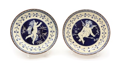 Lot 81 - A pair of Minton Kensington Gore pottery plates