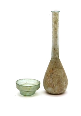 Lot 129 - A Roman green glass vase