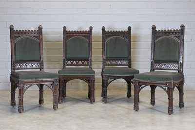 Lot 413 - A set of four Gothic oak single dining chairs