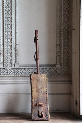 Lot 252 - A three-stringed instrument