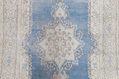 Lot 454 - A wool rug of antique Persian design