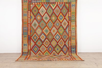 Lot 241 - A kilim wool rug