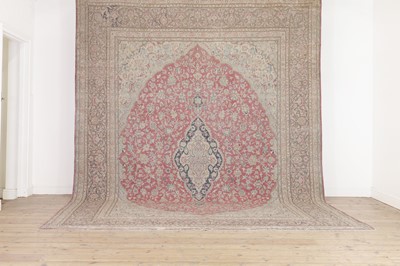Lot 185 - A Kerman wool carpet