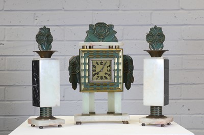 Lot 201 - A French Art Deco bronze-mounted onyx clock garniture