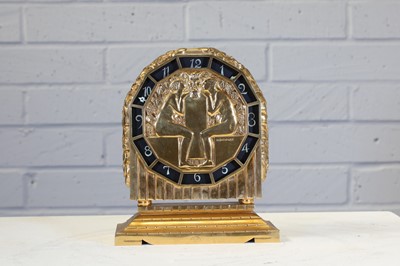 Lot 205 - A French Art Deco gilt-bronze mantel clock