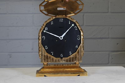 Lot 205 - A French Art Deco gilt-bronze mantel clock