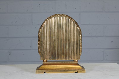 Lot 205 - A French Art Deco gilt-bronze mantel clock