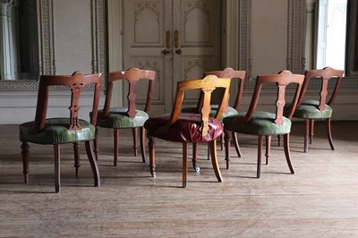 Lot 77 - ☘ A set of four Victorian Aesthetic-style oak library chairs