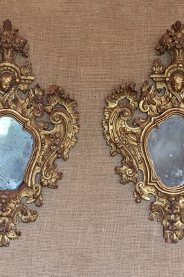 Lot 130 - ☘ A pair of Italian giltwood-framed girandoles