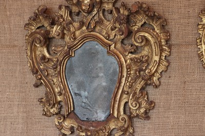 Lot 130 - ☘ A pair of Italian giltwood-framed girandoles