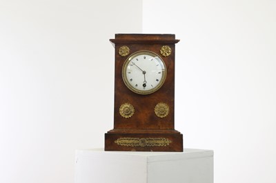 Lot 379 - A French Empire burr oak mantel clock
